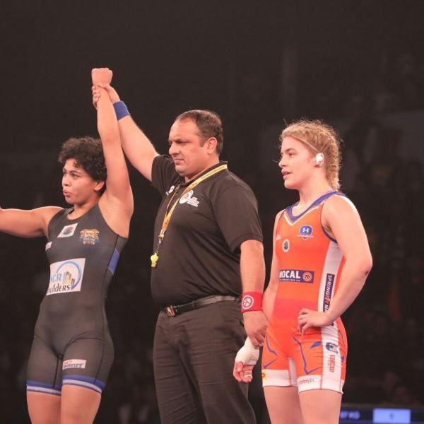 Pooja Dhanda (left) with Helen Maroulis