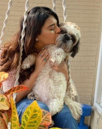 Poonam with her dog Disney