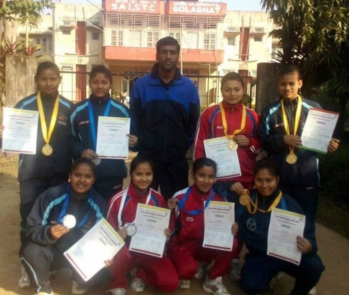 Popy Hazarika (extreme right, standing) with other athletes