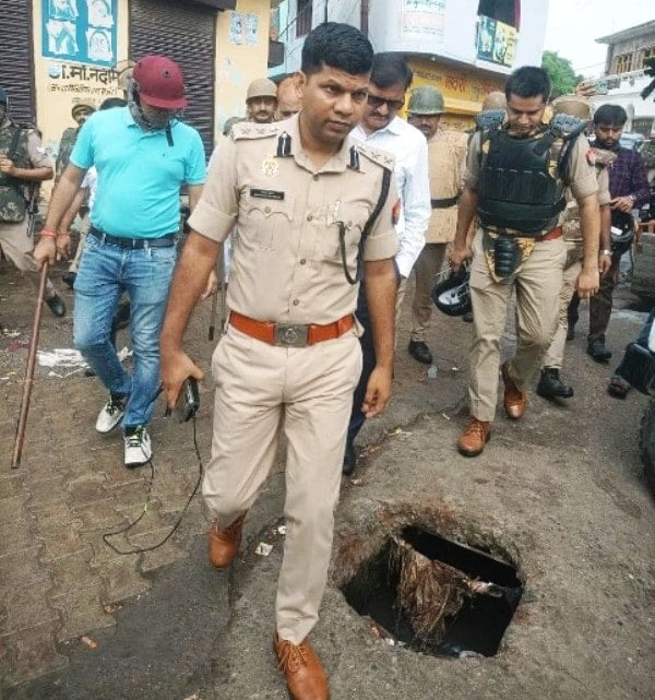 Prabhakar with other policemen during the Bareilly unrest that took place in July 2023