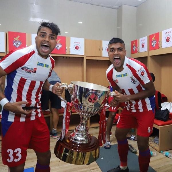 Prabir Das (left) with Pritam Kotal celebrating after winning the ISL title