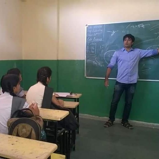 Pradeep Bhandari teaching at the Pink Flower Public School, Indore