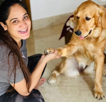 Pragya Mishra posing with her pet