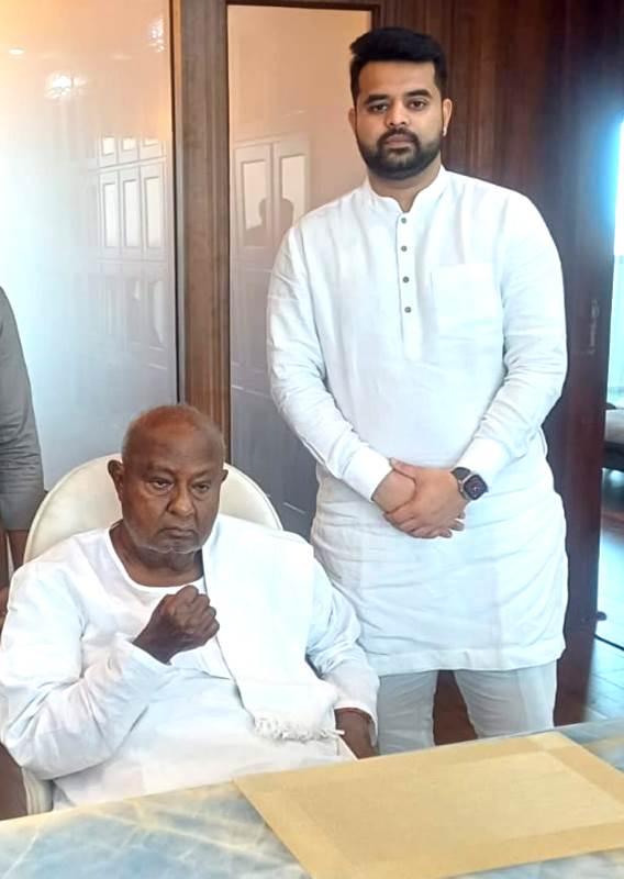 Prajwal Revanna with H. D. Deve Gowda