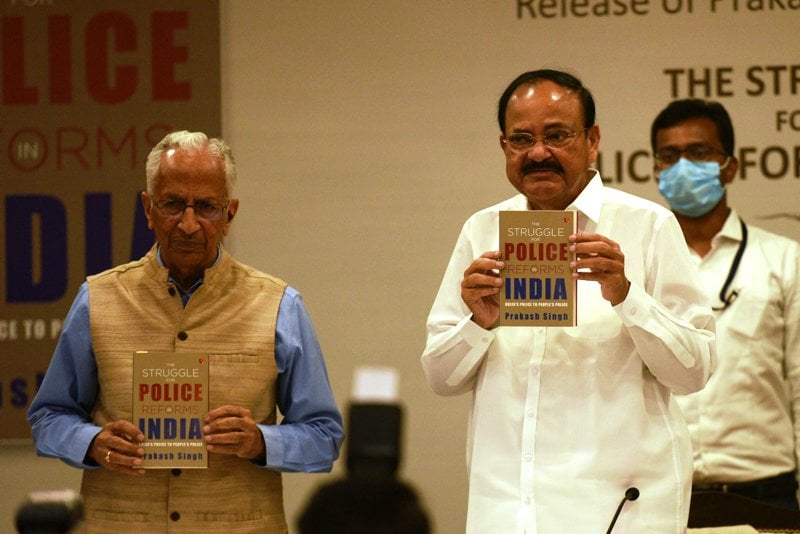 Prakash Singh with Vice President Venkaiah Naidu holding his book The Struggle For Police Reforms In India: Ruler’s Police to People’s Police
