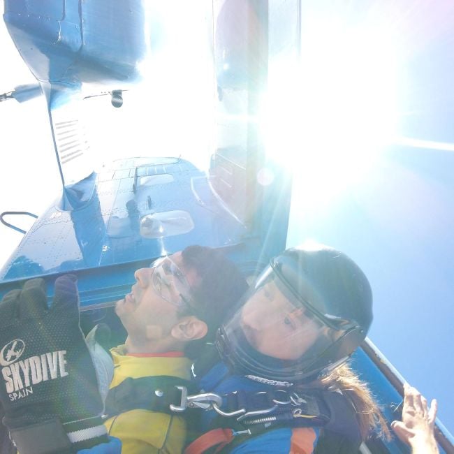 Pranav Sachdev skydiving with an instructor