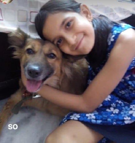 Pranjal Priya with her pet dog