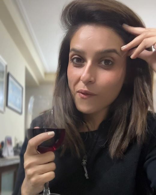 Preeti Dahiya drinking wine