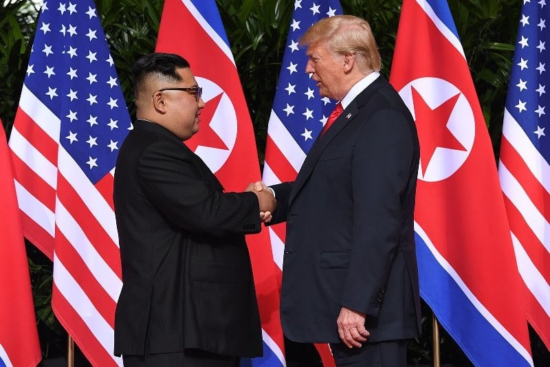 President Donald Trump with Kim Jong-un during a bilateral meeting in Singapore