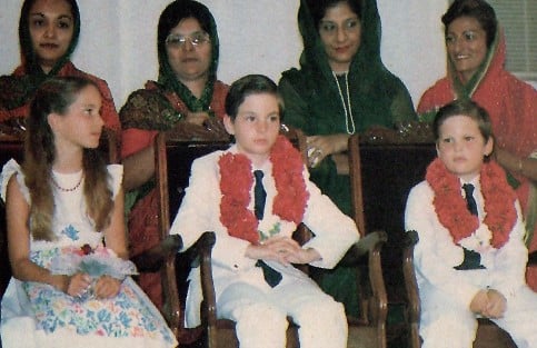 Prince Rahim Aga Khan, centre, with Princess Zahra and Prince Hussain at a jamati mulaqat in 1981 in Kenya