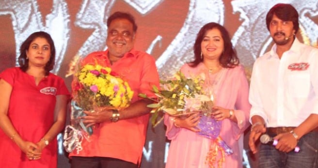 Priya Radhakrishna (extreme left) with Sudeep (extreme right) during the promotion of the film Maanikya