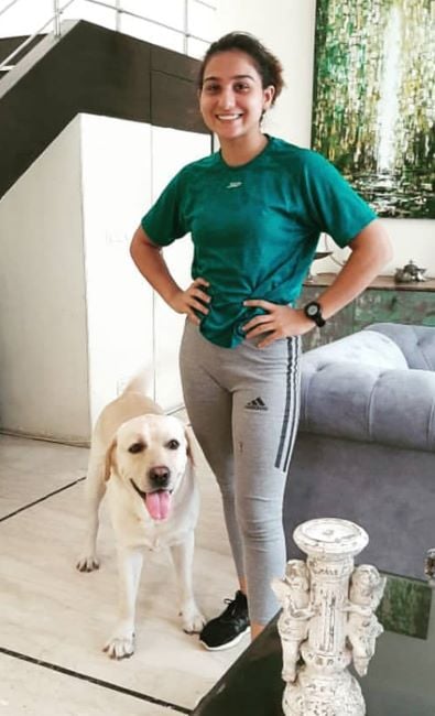 Priya Sharma with her Labrador Retriever