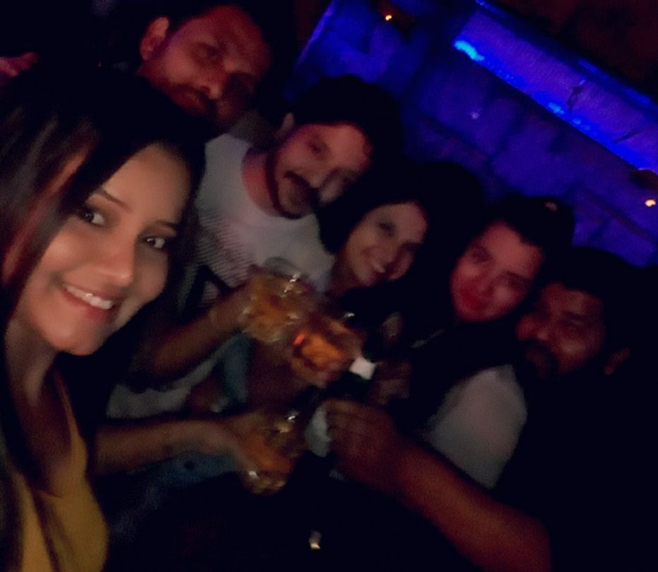 Priya drinking with her friends