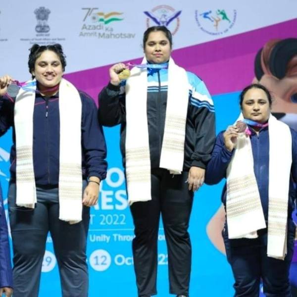 Purnima Pandey (centre) after winning gold in the Khelo India Games in 2022