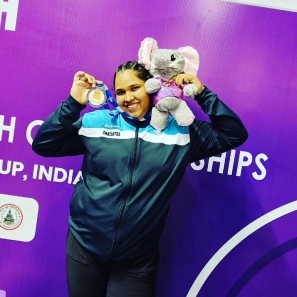 Purnima Pandey in a weightlifting competition