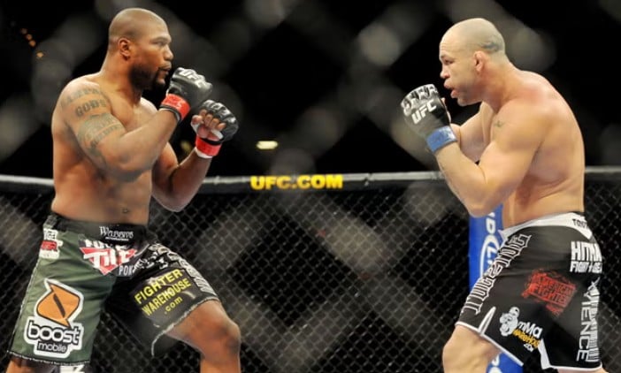 Quinton Jackson fighting with Wanderlei Silva (right)
