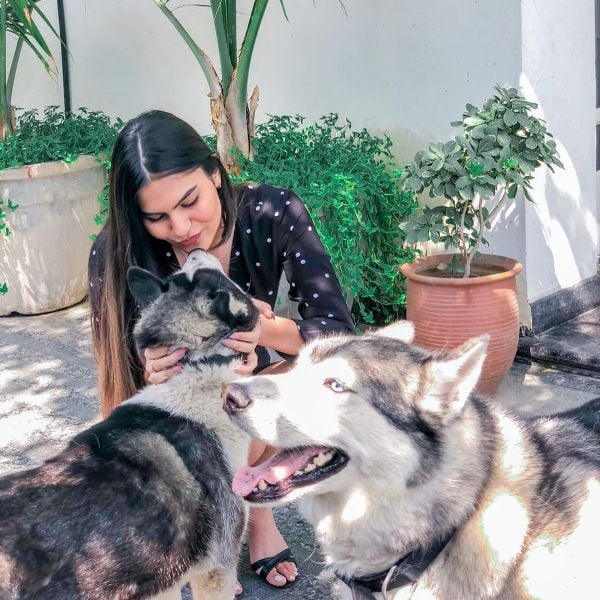 Rachel Gupta with her pet dogs