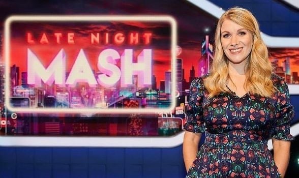 Rachel Parris as the host of the television show Late Night Mash