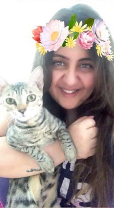 Radhika Khera with her cat, Fifi