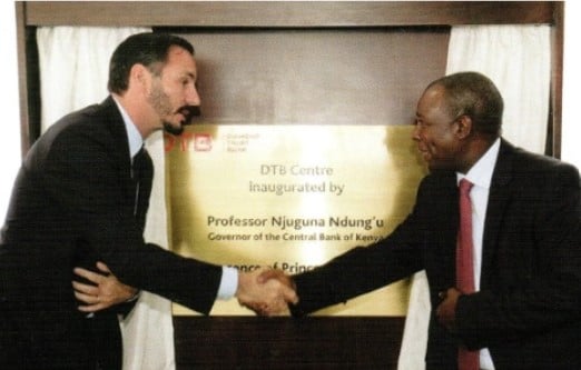 Rahim Al-Hussaini while shaking hands with Professor Njuguna Ndung’u, Governor of Central Bank of Kenya