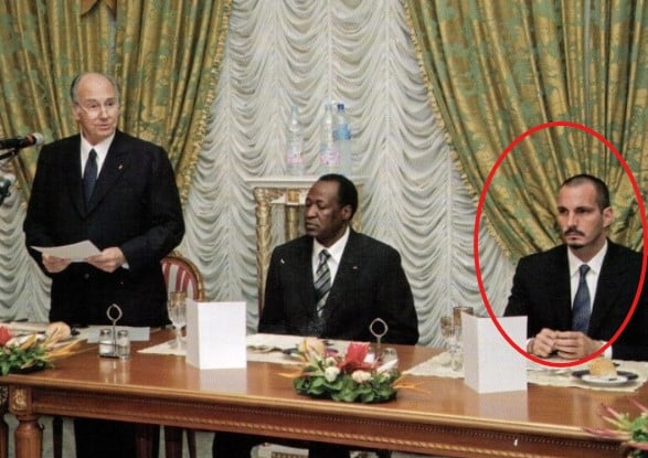 Rahim Al-Hussaini with his father at a dinner in Ouagadougou hosted in honour of Hazar Imam by President Blaise Compaore of Burkina Faso (C.)