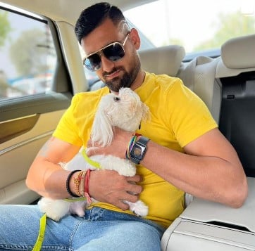 Rahul Chaudhari posing with his pet