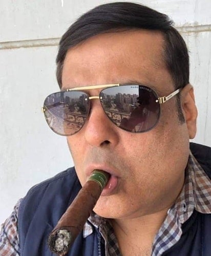 Rahul Mittra smoking cigar