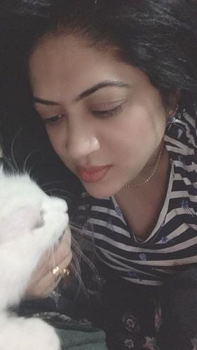 Raima Islam Shimu with her pet cat