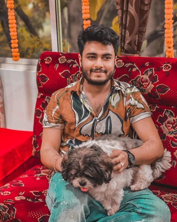 Raj Barman with his dog named Guddu