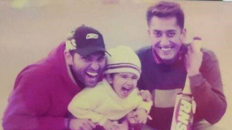 Raj as a child with Yuvraj Singh