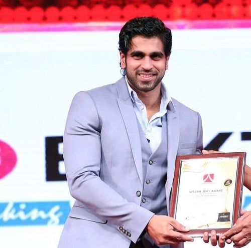 Rajeev Pillai receiving an award