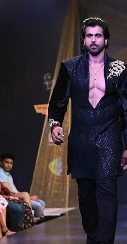 Rajeev Pillai walking the ramp in a fashion show