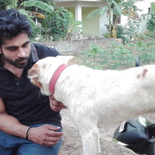 Rajeev Pillai with a dog