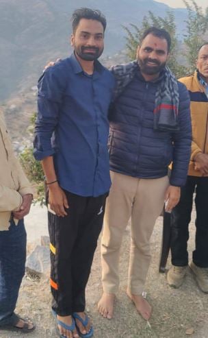 Rajeev Pratap (left) with local people