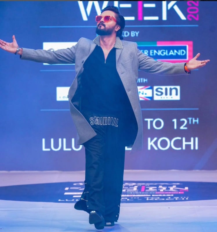 Rajesh Keshav, while walking on the ramp at the Lulu Fashion Week event in 2024