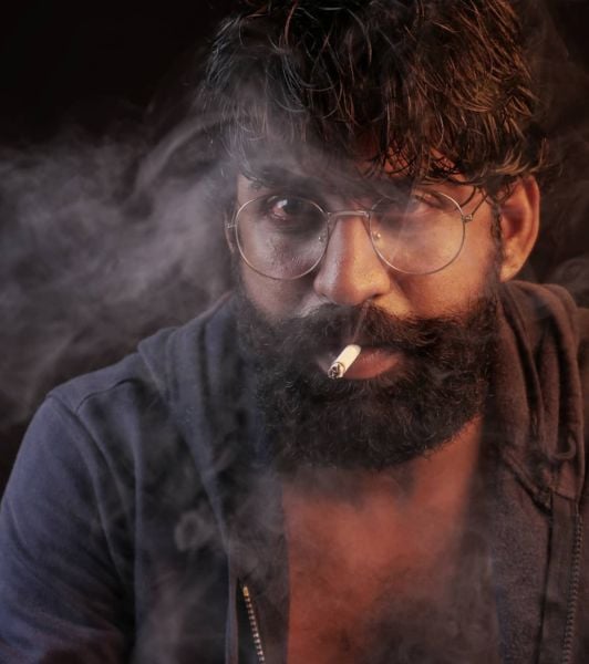 Rajkumar KasiReddy smoking a cigarette