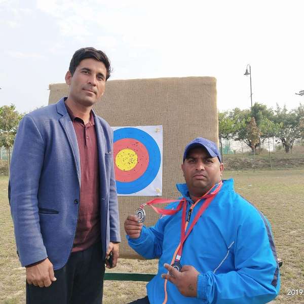 Rakesh Kumar with his coach