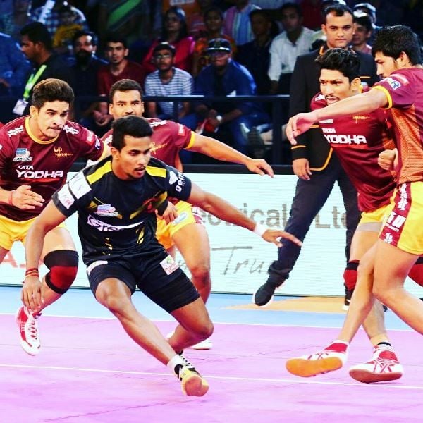 Rakshith S (in black jersey) during a match in Pro Kabaddi League Season 6