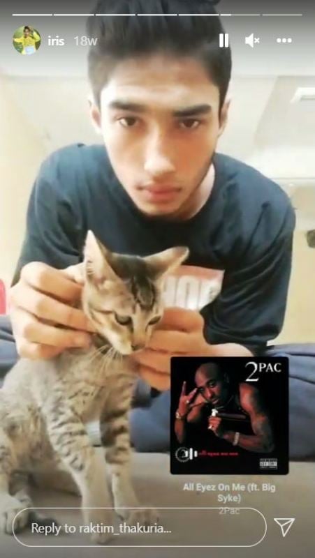 Raktim Thakuria with his cat, Iris