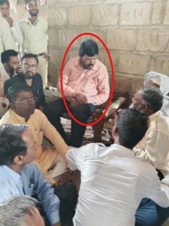 Ramdas Athawale while listening to the problems of local people