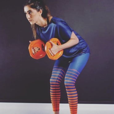 Rana Nadya while exercising at a gym