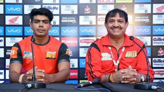 Randhir Singh Sehrawat, right, with Pawan Kumar Sehrawat