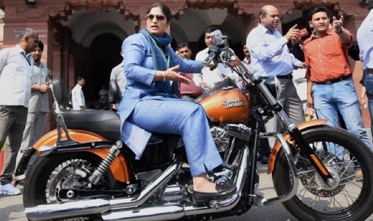 Ranjeet Ranjan on her Harley Davidson outside Parliament