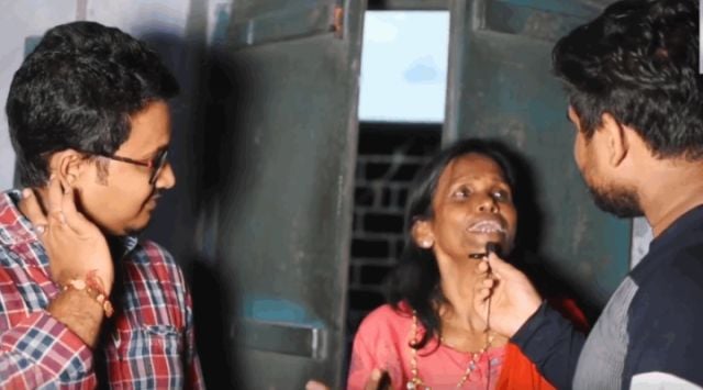 Ranu Mondal with Atindra Chakraborty and his friend