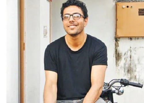 Ranveer Brar sitting on his first bike
