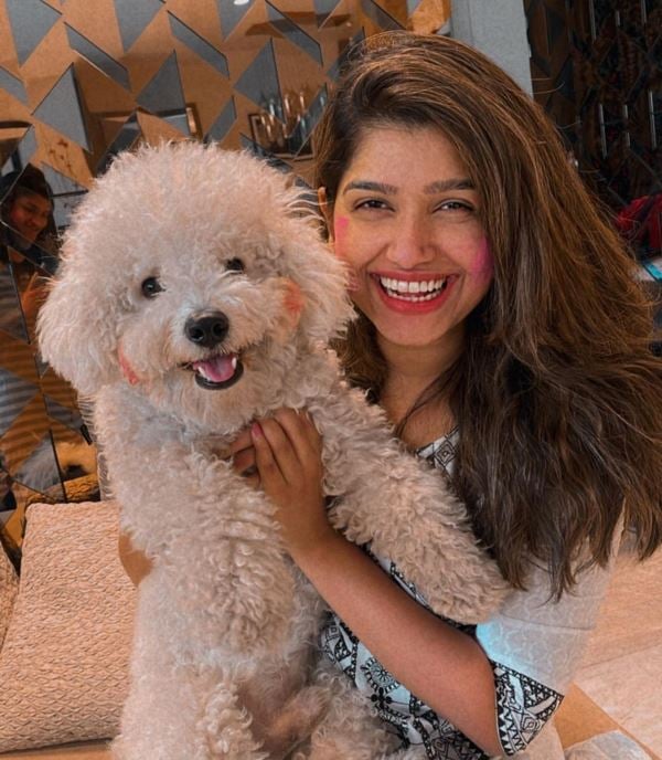 Rasika Sunil with her dog, Rush