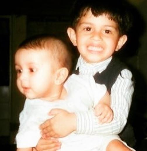 Raunaq Kamdar in childhood with his sister