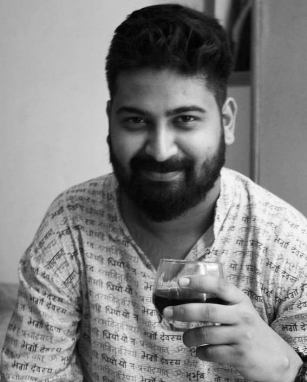 Ravi Gupta drinking wine