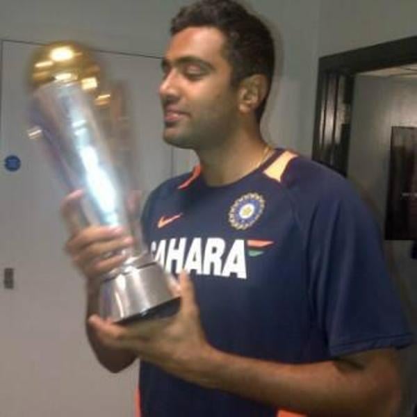 Ravichandran Ashwin posing with the Champions Trophy