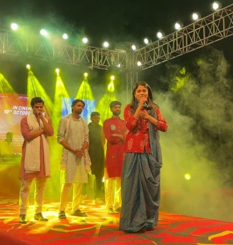 Reeva Rachh while anchoring an event